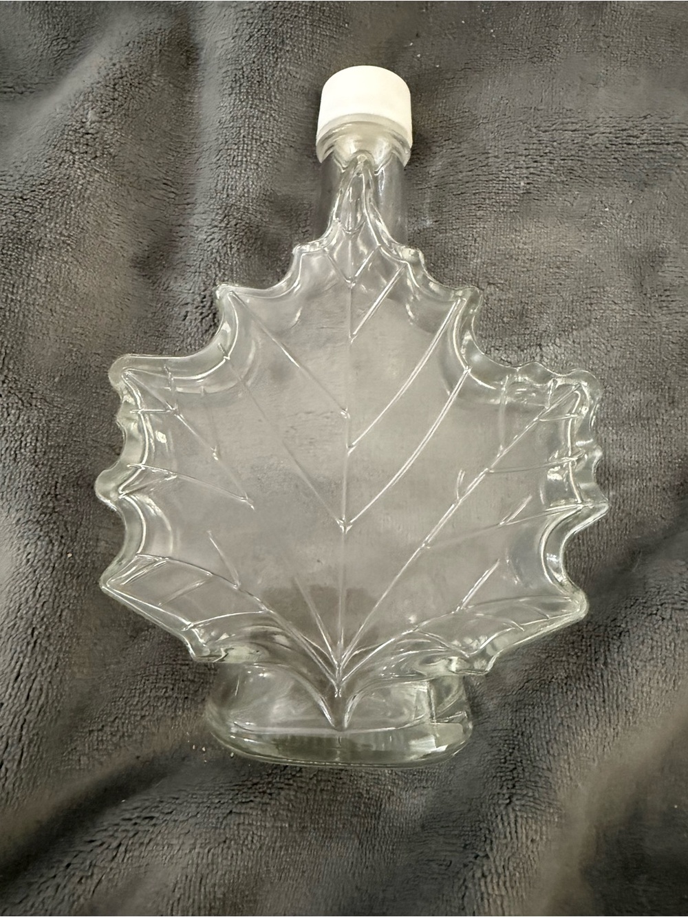 Source Unknown Clear Glass Maple Leaf Bottle with White Cap
